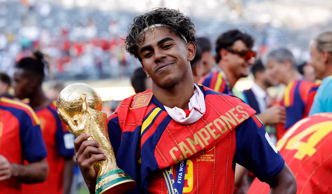 Lamine-Yamal-of-Spain-celebrates-the-World-Cup-victory-with-the-trophy-on-July-19-2026